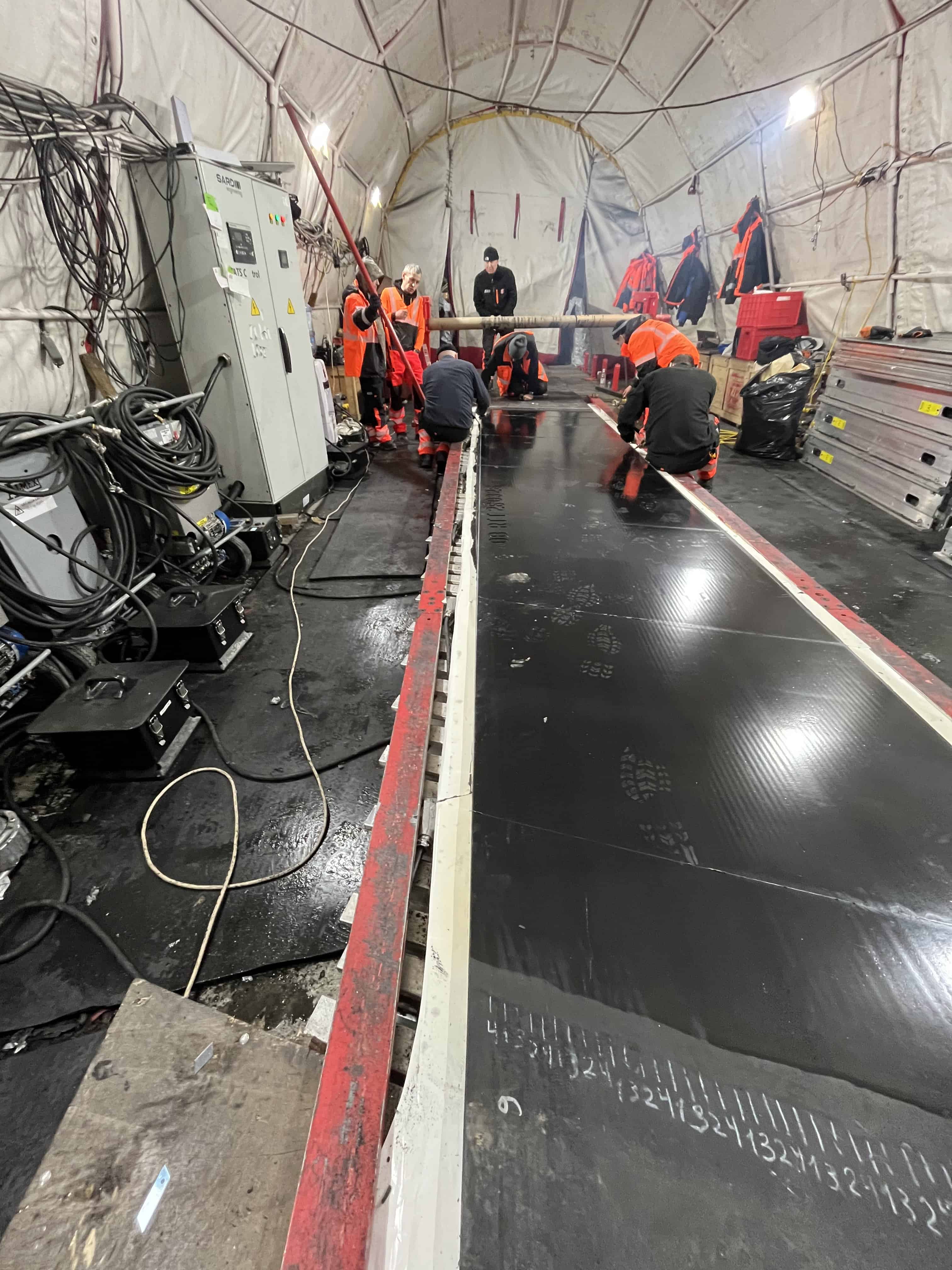 REMA TIP TOP team vulcanizing ST6000 conveyor belt splices inside heated tent, Armenia